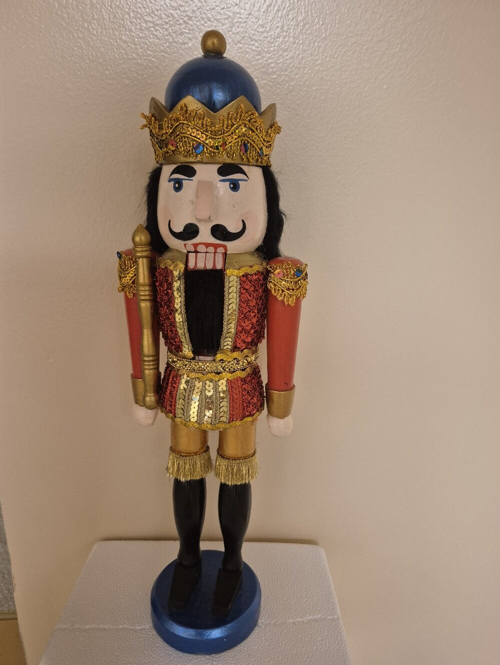 Festive Red & Gold Nutcracker Figurine with Blue Crown